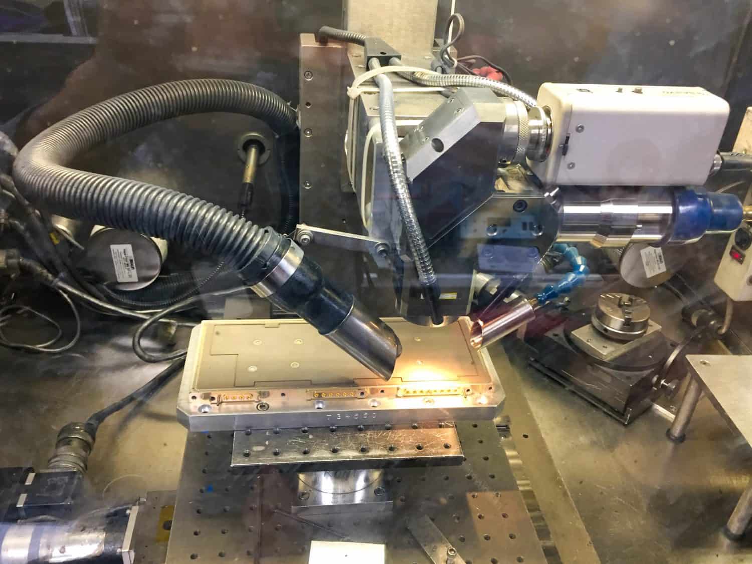 Laser welding inside a glovebox