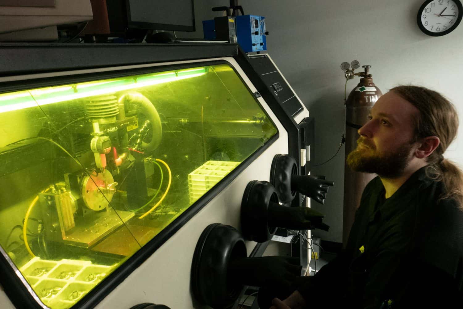 Technician At A Glove Box